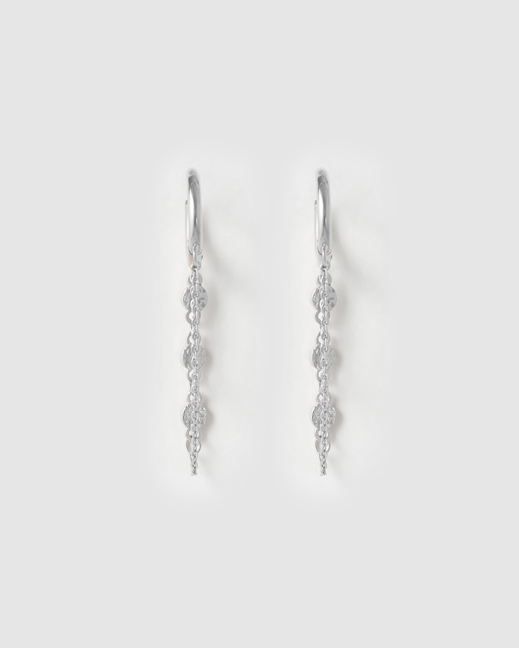Arms of Eve - Paloma Huggie Earrings - Silver
